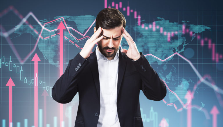 Portrait Of Stressed Young Man With Business Chart And Growing Red Arrows On Blurry Background. Financial Growth, Trade And Market Concept. Double Exposure. - Contabilidade em Santa Catarina | Amaral Contabilidade